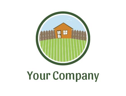 farmhouse with farm and fence in circle frame